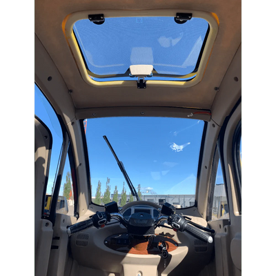 GIO GOLF ENCLOSED MOBILITY SCOOTER 60V 1200W, top speed 18mph, Range up to 30 miles, backup camera, heater, fan, alarm, media center, 500lb load capacity