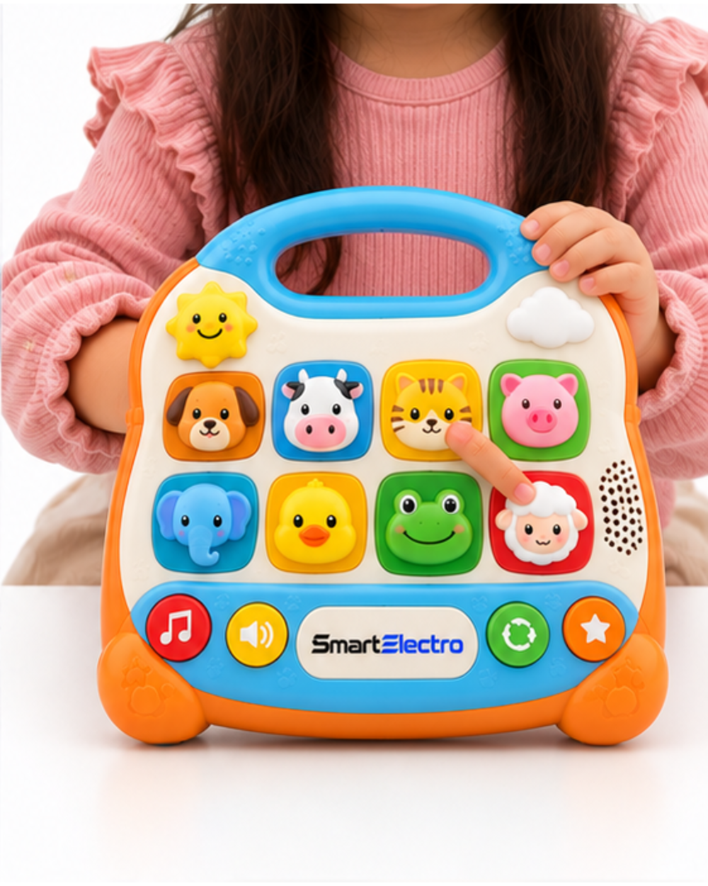Child pressing the sheep button on the soft orange animal sound learning toy