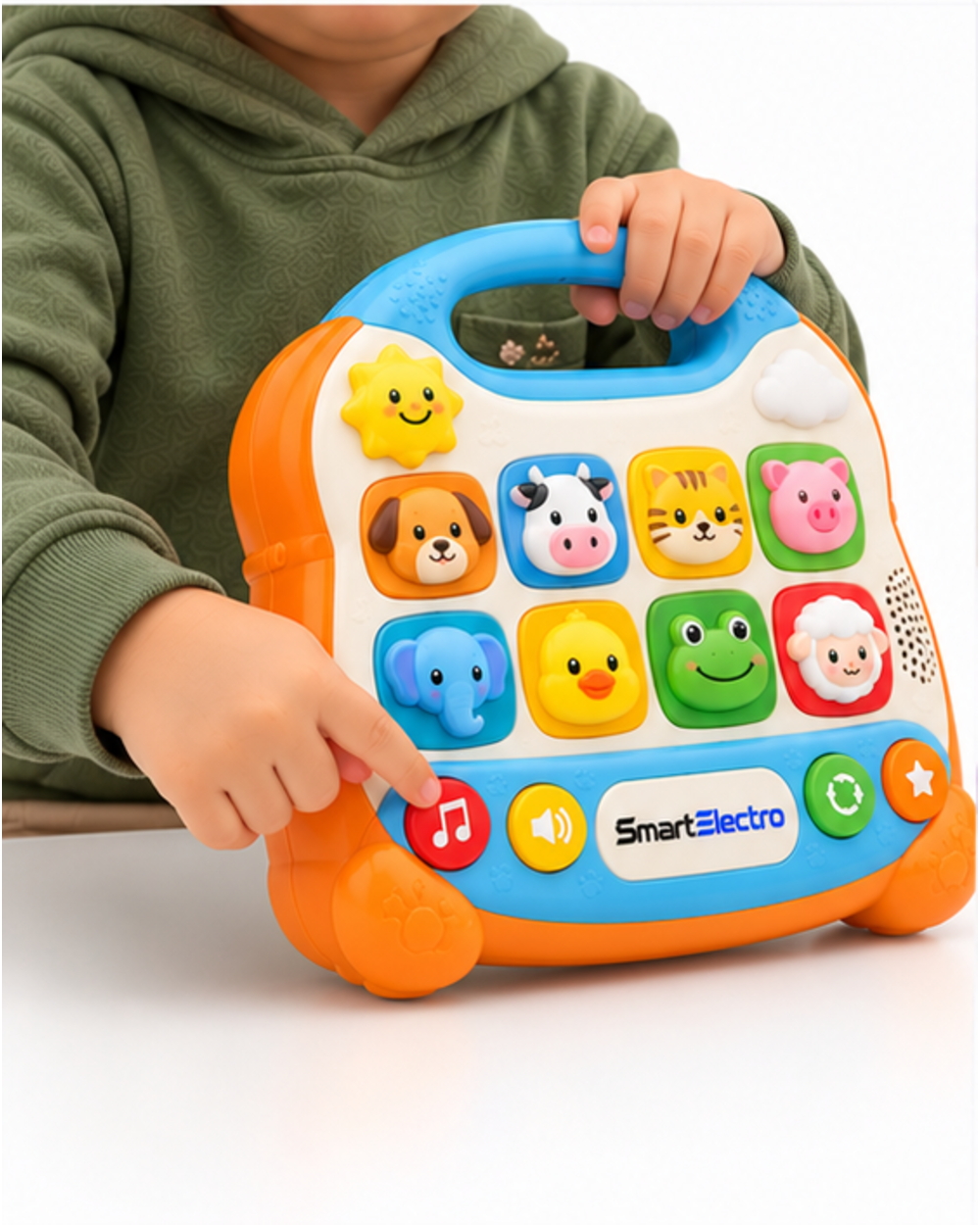 Child pressing the music button on the SmartElectro animal sound learning toy