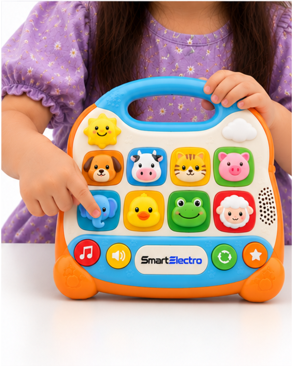 Child pressing the elephant button on the soft orange animal sound learning toy