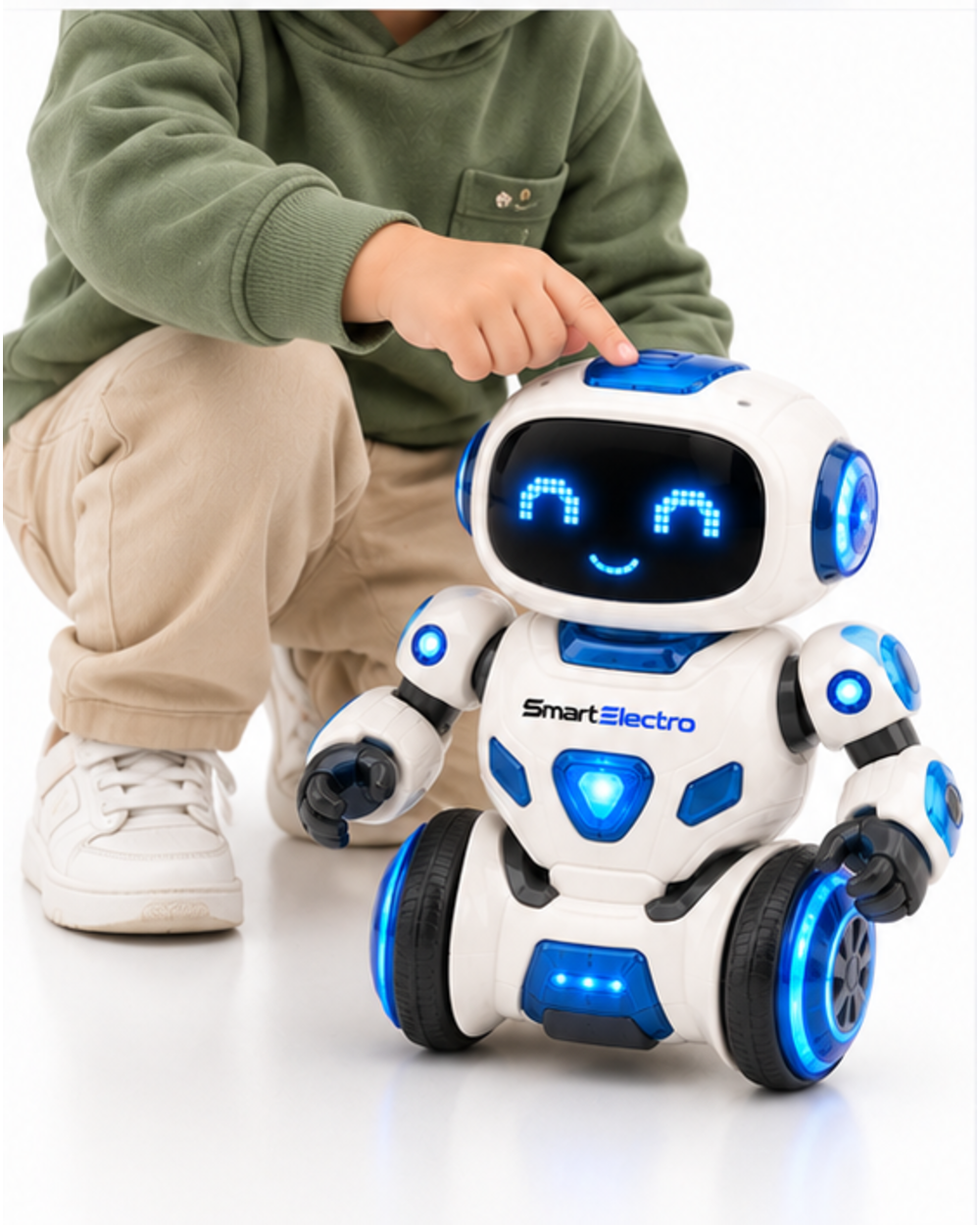 Child pressing the top button on the SmartElectro dancing robot toy