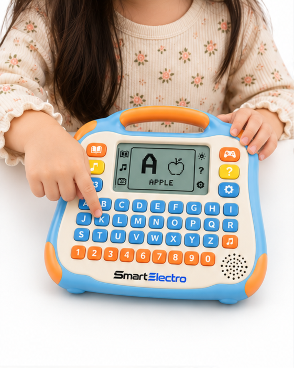 Child pressing a letter button on the SmartElectro learning tablet toy