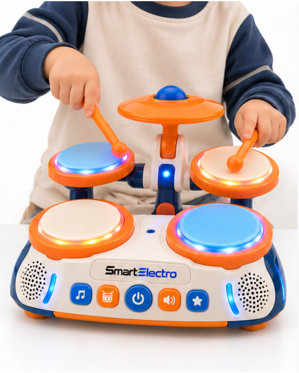 Child playing the SmartElectro toy drum set with both drumsticks